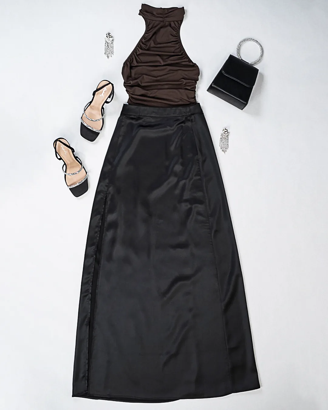 Studio flatlay of a black outfit